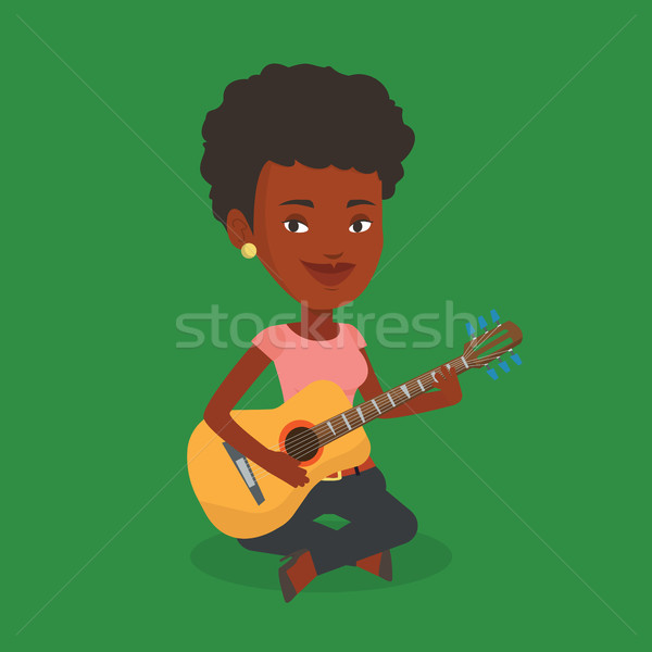 Kobieta gry muzyk posiedzenia gitara Zdjęcia stock © RAStudio