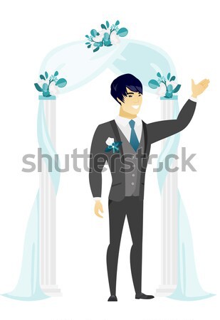 Happy groom standing under the wedding arch. Stock photo © RAStudio