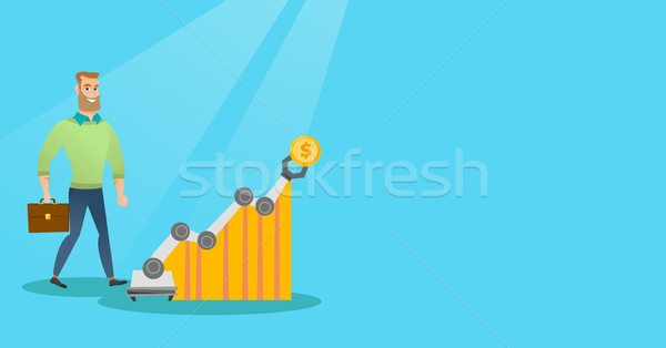 Stock photo: Man looking at profit chart with robotic arm.