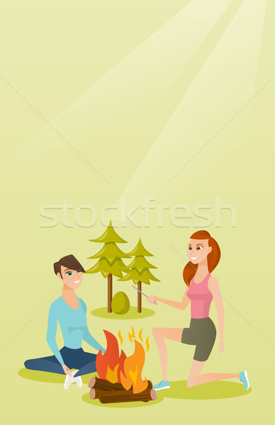 二 朋友 坐在 周圍 篝火 露營 商業照片 © RAStudio