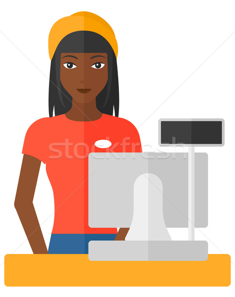 Stock photo: Saleslady standing at checkout.