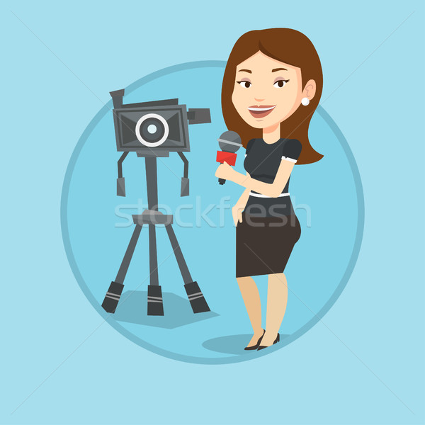 Stock photo: TV reporter with microphone and camera.