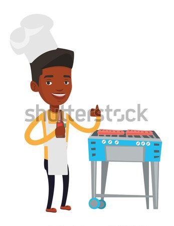Woman cooking meat on gas barbecue grill. Stock photo © RAStudio