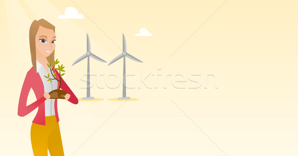 Woman holding small plant vector illustration. Stock photo © RAStudio