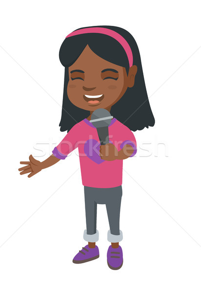 Stock photo: African little girl singing into a microphone.