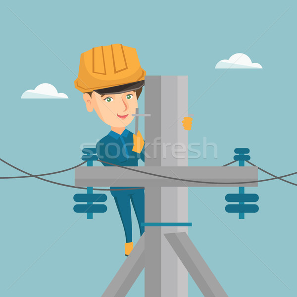 Electrician working on electric power pole. Stock photo © RAStudio
