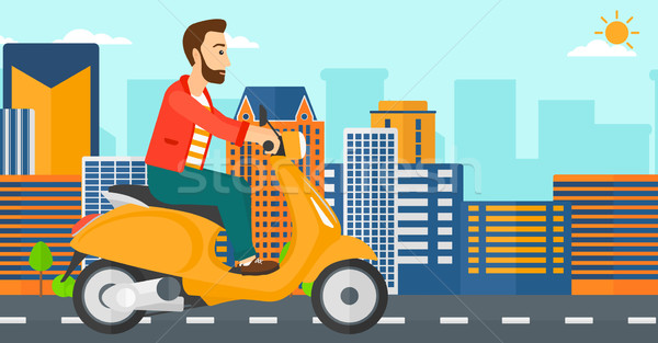 Man riding scooter. Stock photo © RAStudio