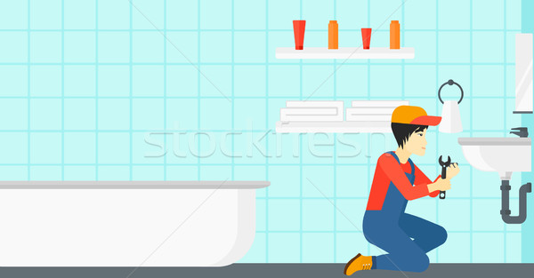 Man repairing sink. Stock photo © RAStudio
