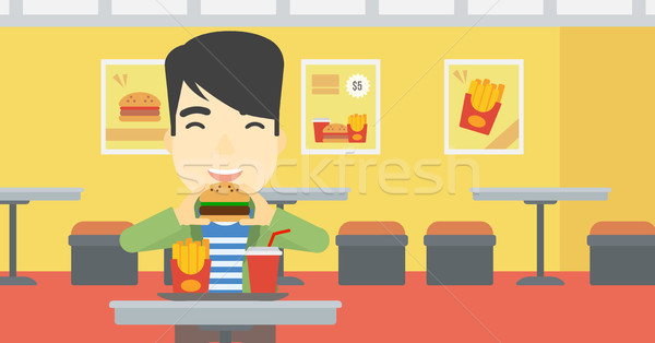 Man eating hamburger vector illustration. Stock photo © RAStudio