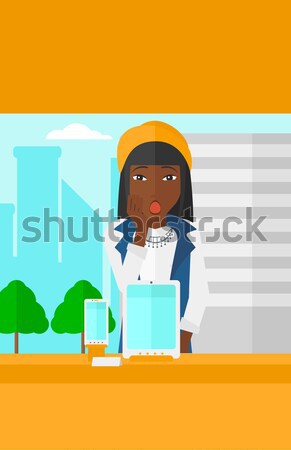 Woman looking at shop window. Stock photo © RAStudio