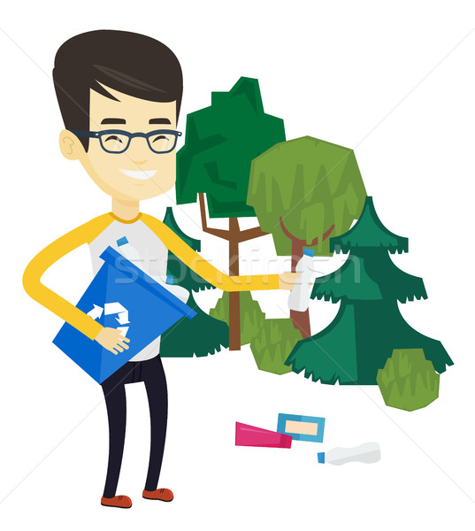 Hombre recoger basura forestales reciclar Foto stock © RAStudio