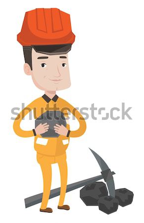 Miner holding coal in hands vector illustration. Stock photo © RAStudio