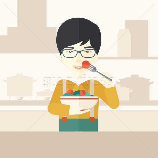 Man eating salad. Stock photo © RAStudio