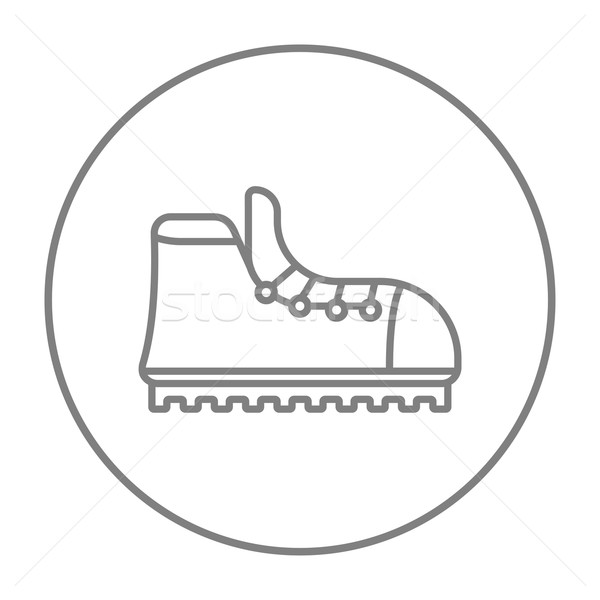 Hiking boot with crampons line icon. Stock photo © RAStudio