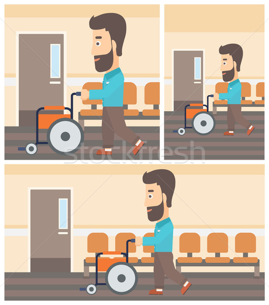 Man pushing wheelchair. Stock photo © RAStudio