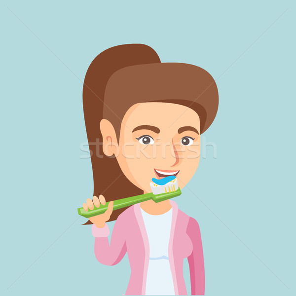 Young caucasian woman brushing teeth. Stock photo © RAStudio