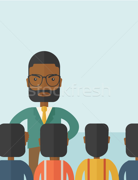 Angry black boss facing at his employees. Stock photo © RAStudio