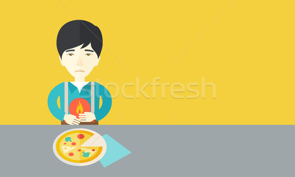 Man with heartburn. Stock photo © RAStudio