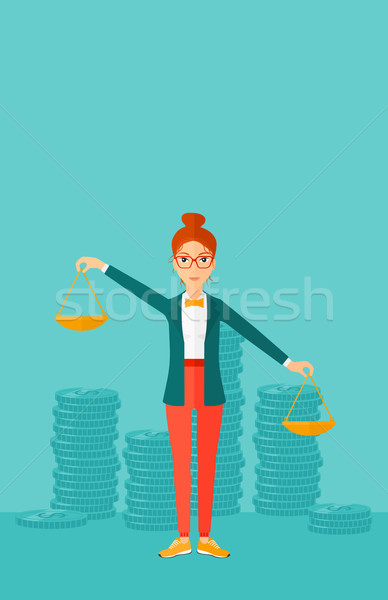 Business woman with scales. Stock photo © RAStudio