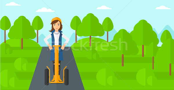 Woman riding on electric scooter. Stock photo © RAStudio