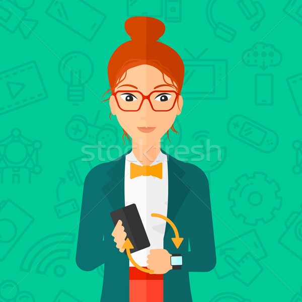 Synchronization of smartphone and smartwatch. Stock photo © RAStudio