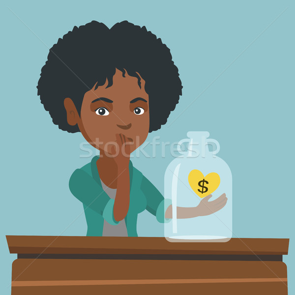 African broke woman looking at empty money box. Stock photo © RAStudio