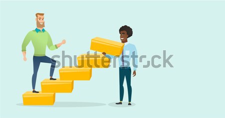 Caucasian businessman runs up the career ladder. Stock photo © RAStudio