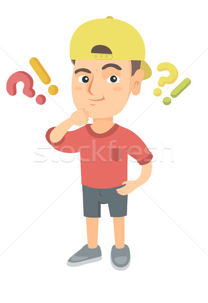 Boy standing under question and exclamation marks. Stock photo © RAStudio