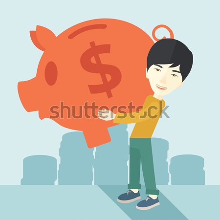 Chinese businessman carries a big piggy bank for saving money. Stock photo © RAStudio