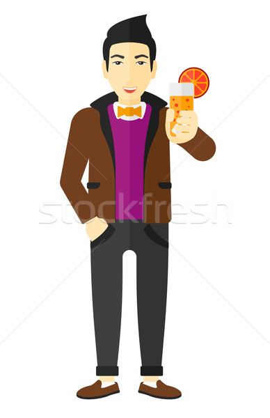 Man holding glass of juice. Stock photo © RAStudio