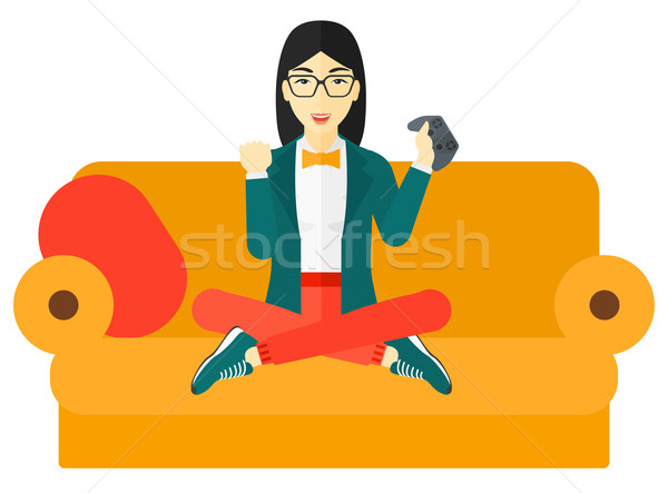 Woman playing video game. Stock photo © RAStudio