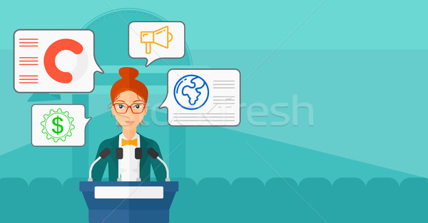 Woman speaking on podium. Stock photo © RAStudio