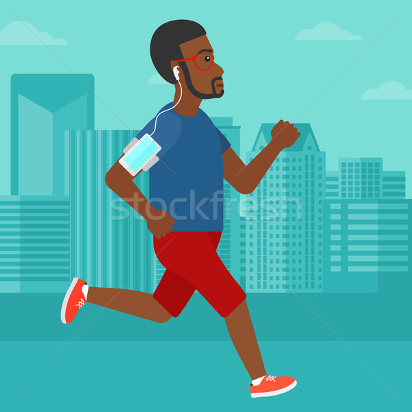 Stockfoto: Man · jogging · smartphone · opleiding