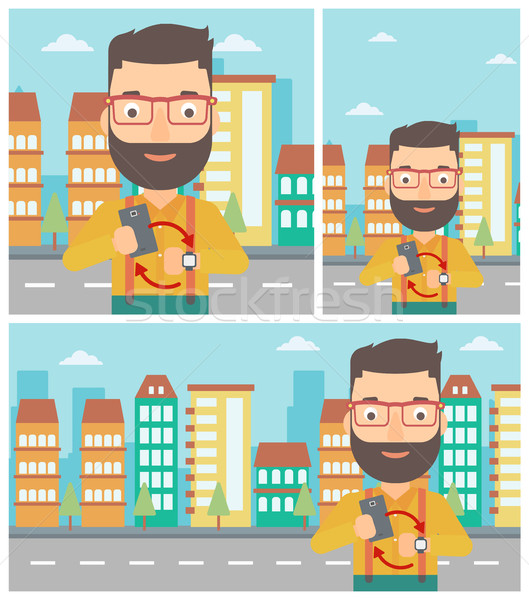 Synchronization between smartwatch and smartphone. Stock photo © RAStudio
