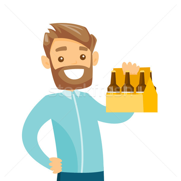 Young caucasian white man with pack of beer. Stock photo © RAStudio