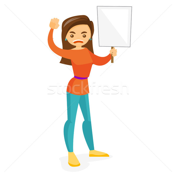 Young feminist holding placard at protest action. Stock photo © RAStudio
