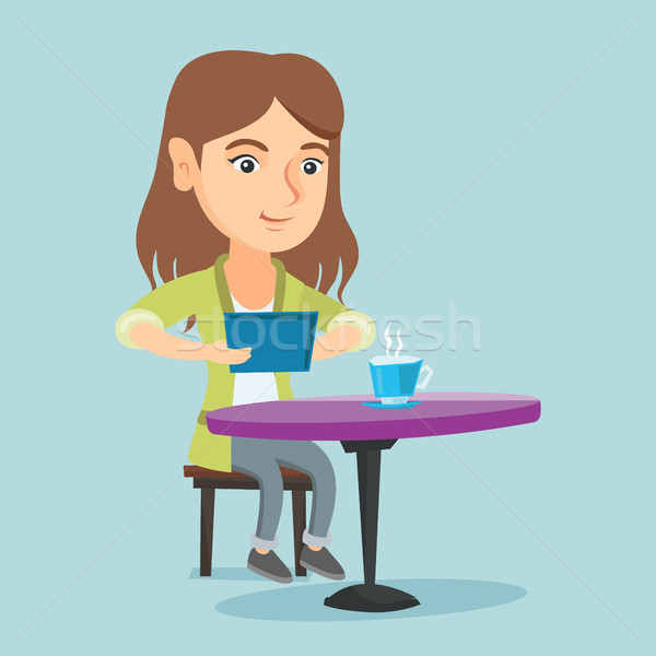 Woman surfing in the social network in the cafe. Stock photo © RAStudio