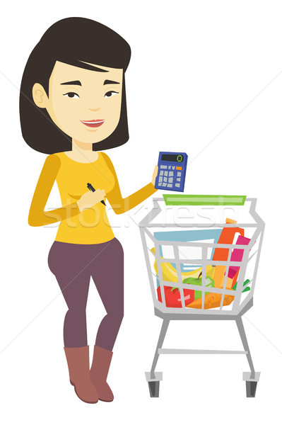 Female customer counting on calculator. Stock photo © RAStudio
