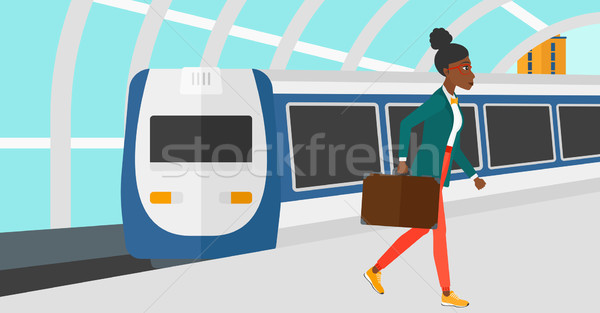 Woman going out of train. Stock photo © RAStudio