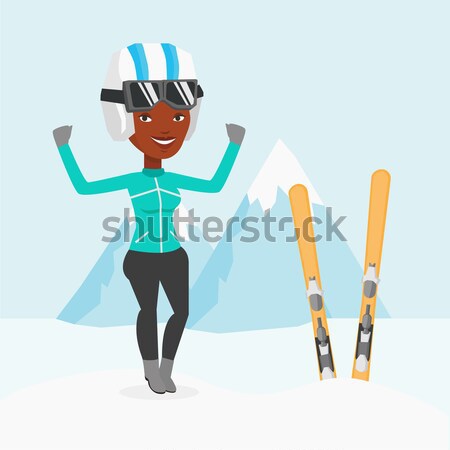 Cheerful skier standing with raised hands. Stock photo © RAStudio