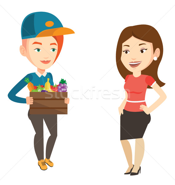 Delivery courier delivering groceries to customer. Stock photo © RAStudio