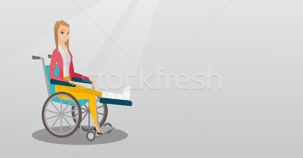 Woman with broken leg sitting in a wheelchair. Stock photo © RAStudio