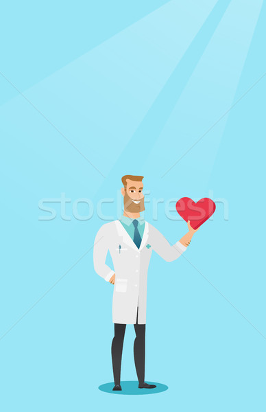 Arzt Kardiologe halten Herz medizinischen Stock foto © RAStudio