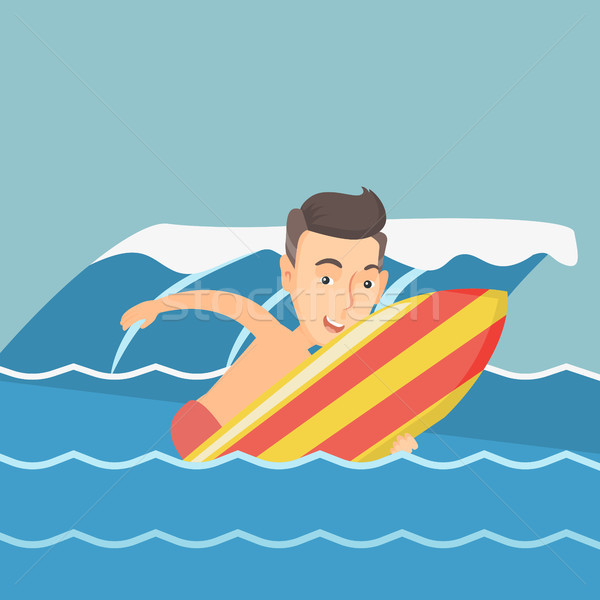 Happy surfer in action on a surfboard. Stock photo © RAStudio