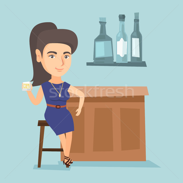 Young caucasian woman sitting at the bar counter. Stock photo © RAStudio