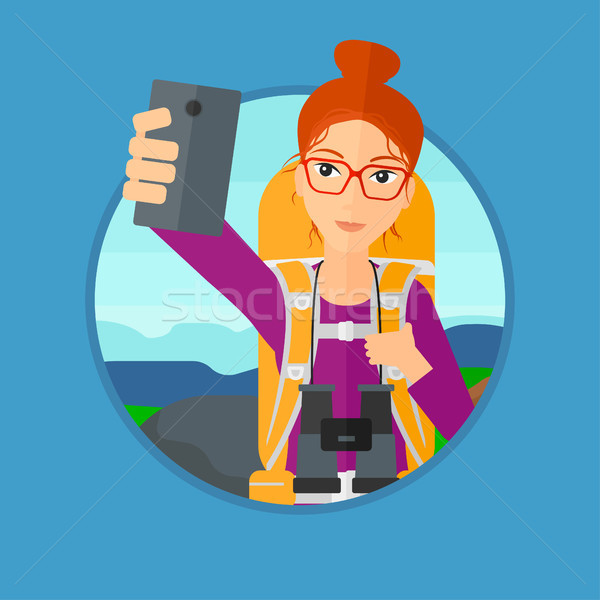 Woman with backpack making selfie. Stock photo © RAStudio