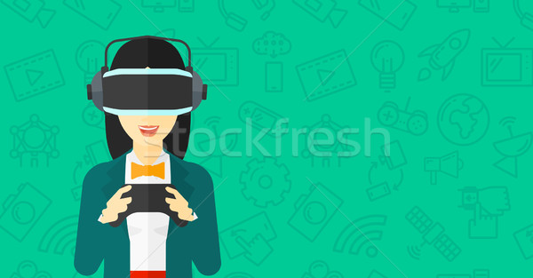 Woman wearing virtual reality headset. Stock photo © RAStudio