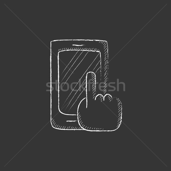 Finger pointing at smart phone. Drawn in chalk icon. Stock photo © RAStudio