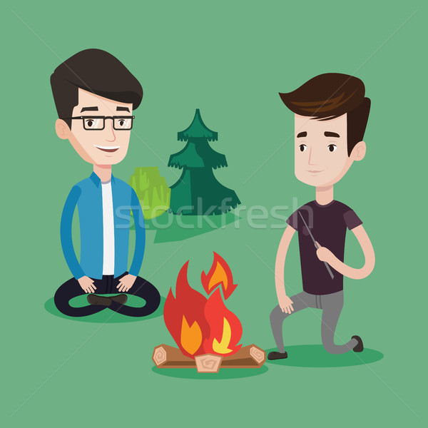 Deux amis séance autour feu de joie camping [[stock_photo]] © RAStudio
