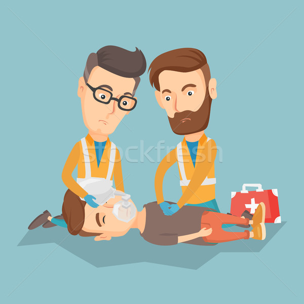 Emergency doctors carrying man on stretcher. Stock photo © RAStudio